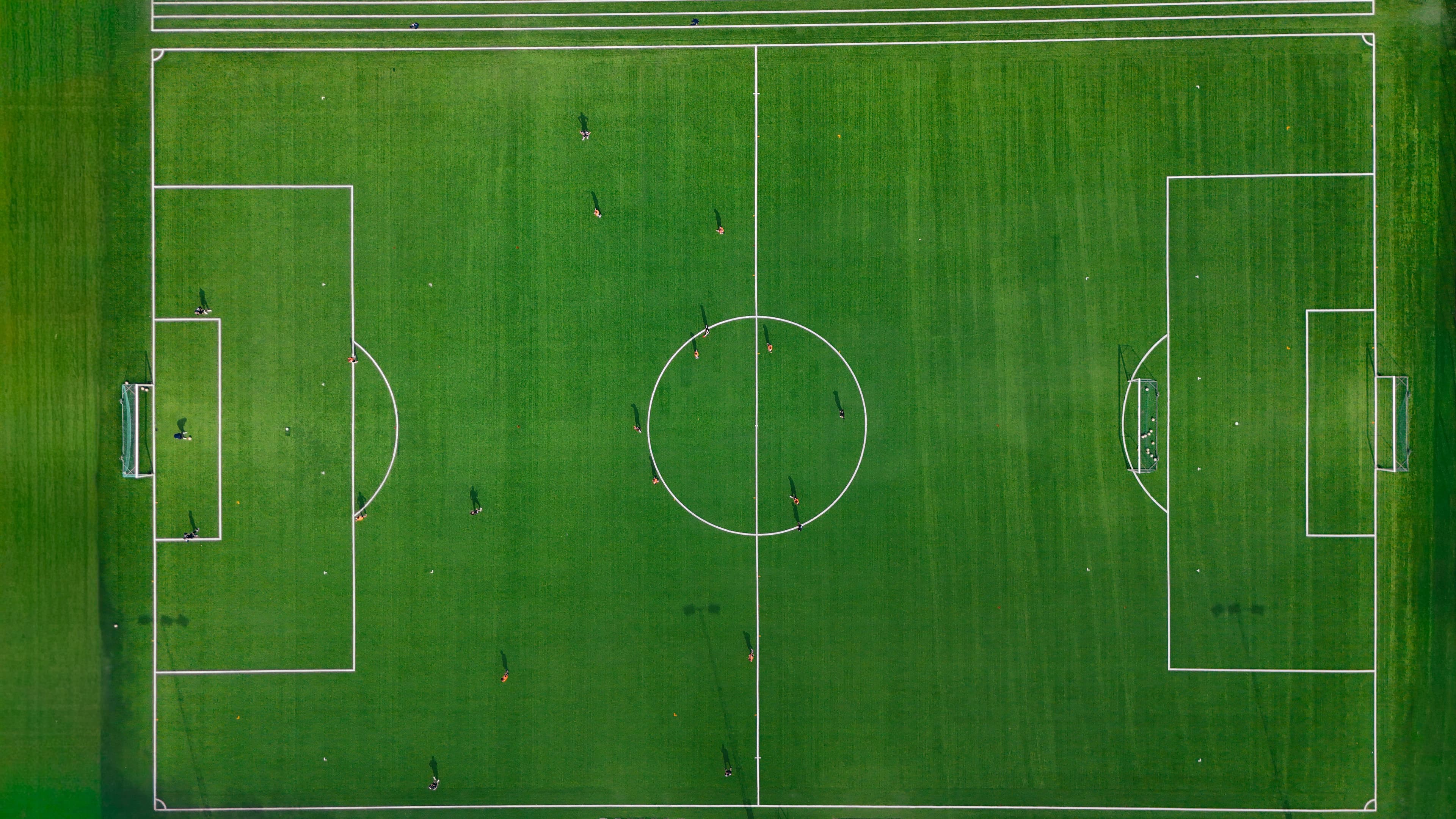 Training balls and a cone set out on the field